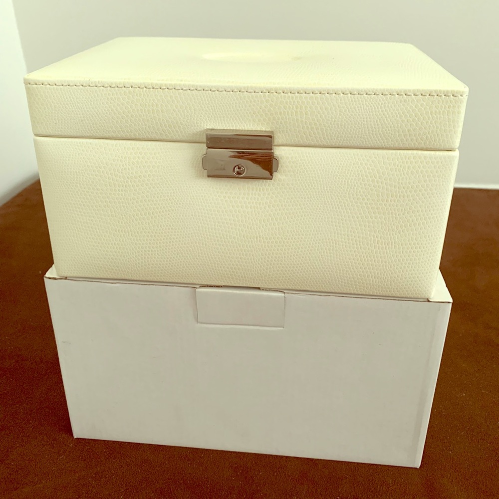 Faux leather jewelry box with a key
